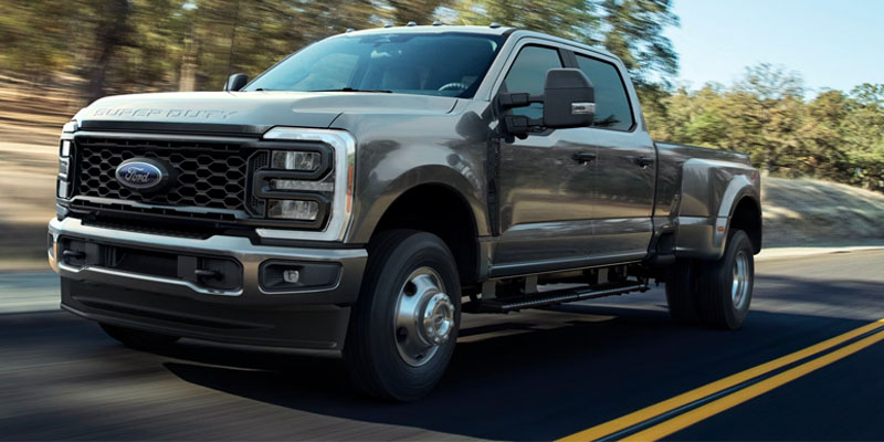 2026 silver super duty Ford Truck cruising on road